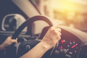 Photo of a person driving a car