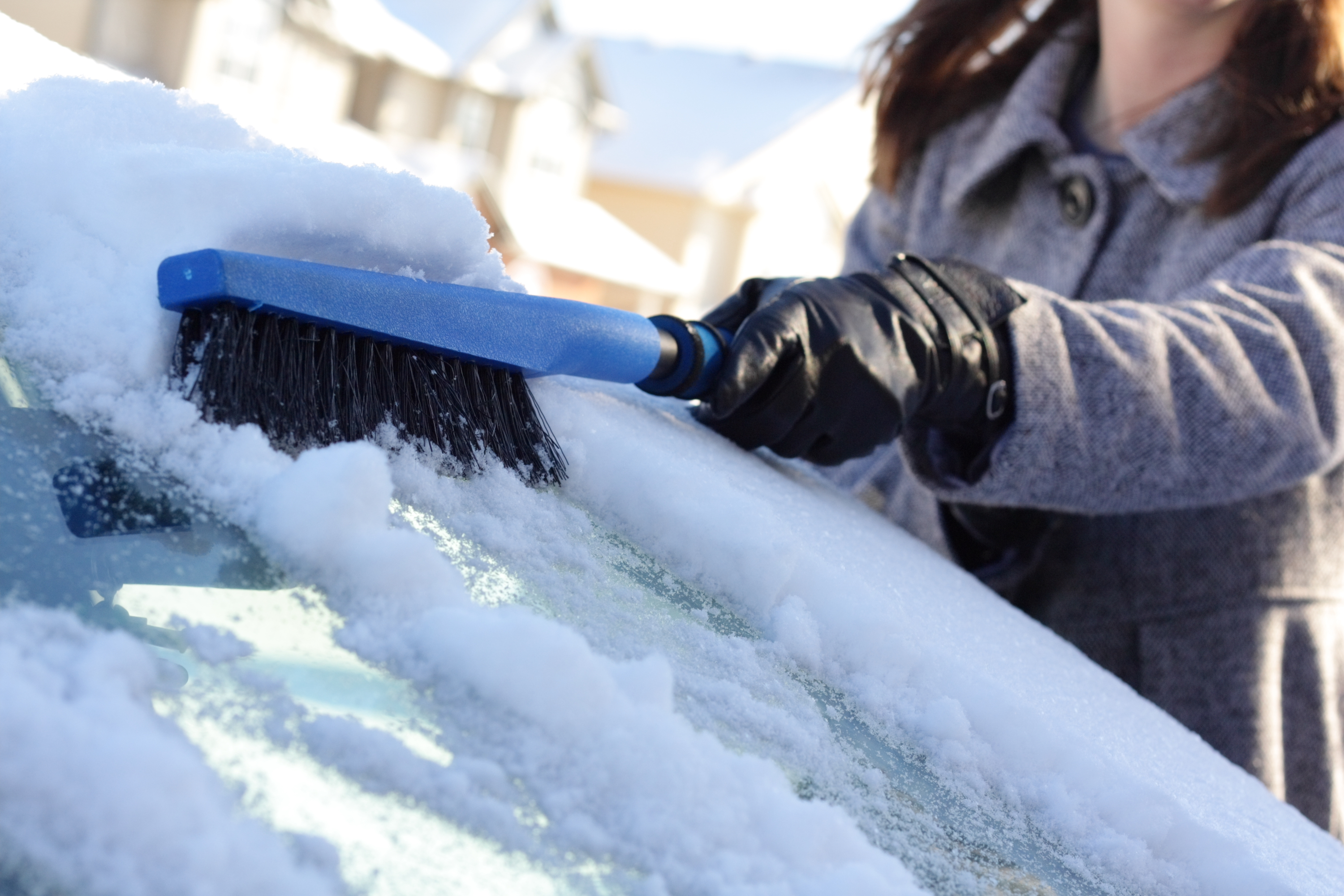 How to Safely Brush Snow Off Your Car